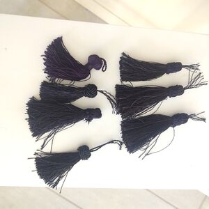 7 Smaller Black Tassels